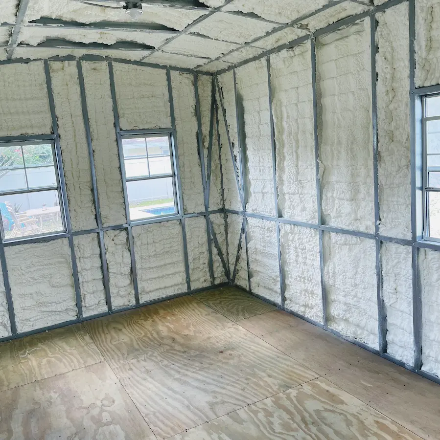Closed-cell spray foam insulation applied to wall cavities in a residential project in Zanesville